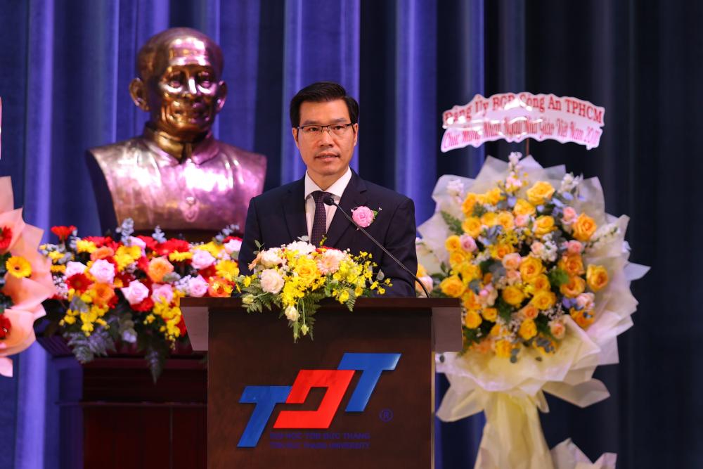 Dr. Tran Trong Dao, President of TDTU, delivering a speech at the anniversary program